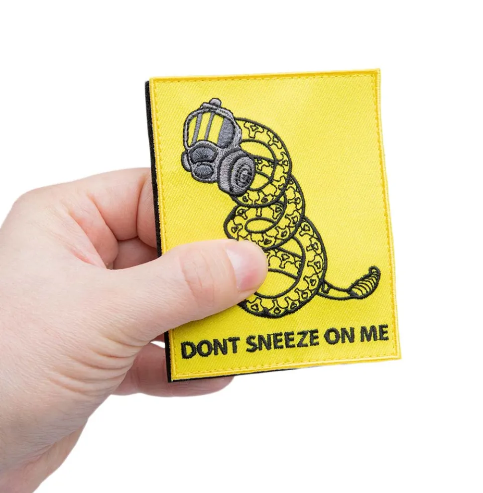 Varusteleka Don't Sneeze on Me moraalimerkki