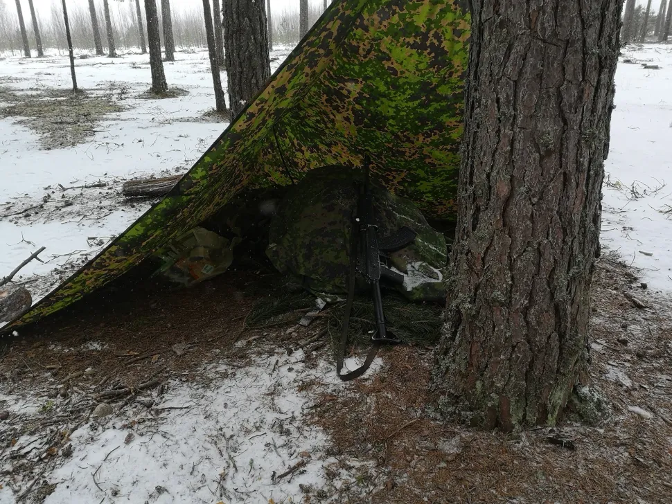 Varusteleka Repun/rinkan sadesuoja, maastokuvioitu